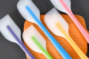 Custom silicone spatulas in different colors with logos