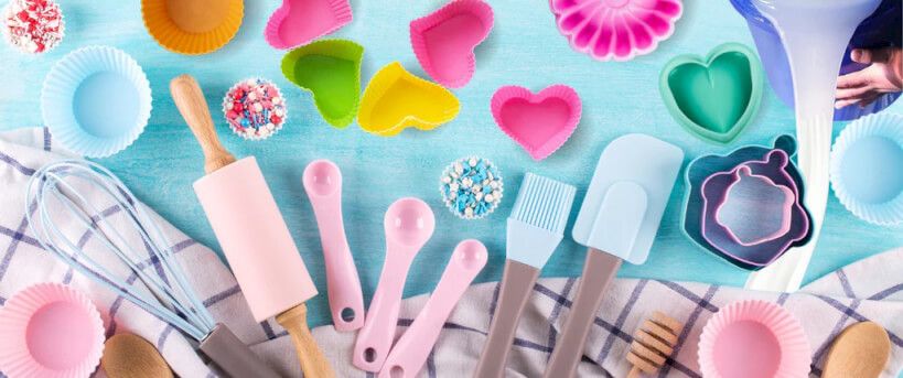 Non-toxic silicone spatulas and baking mats in a modern kitchen